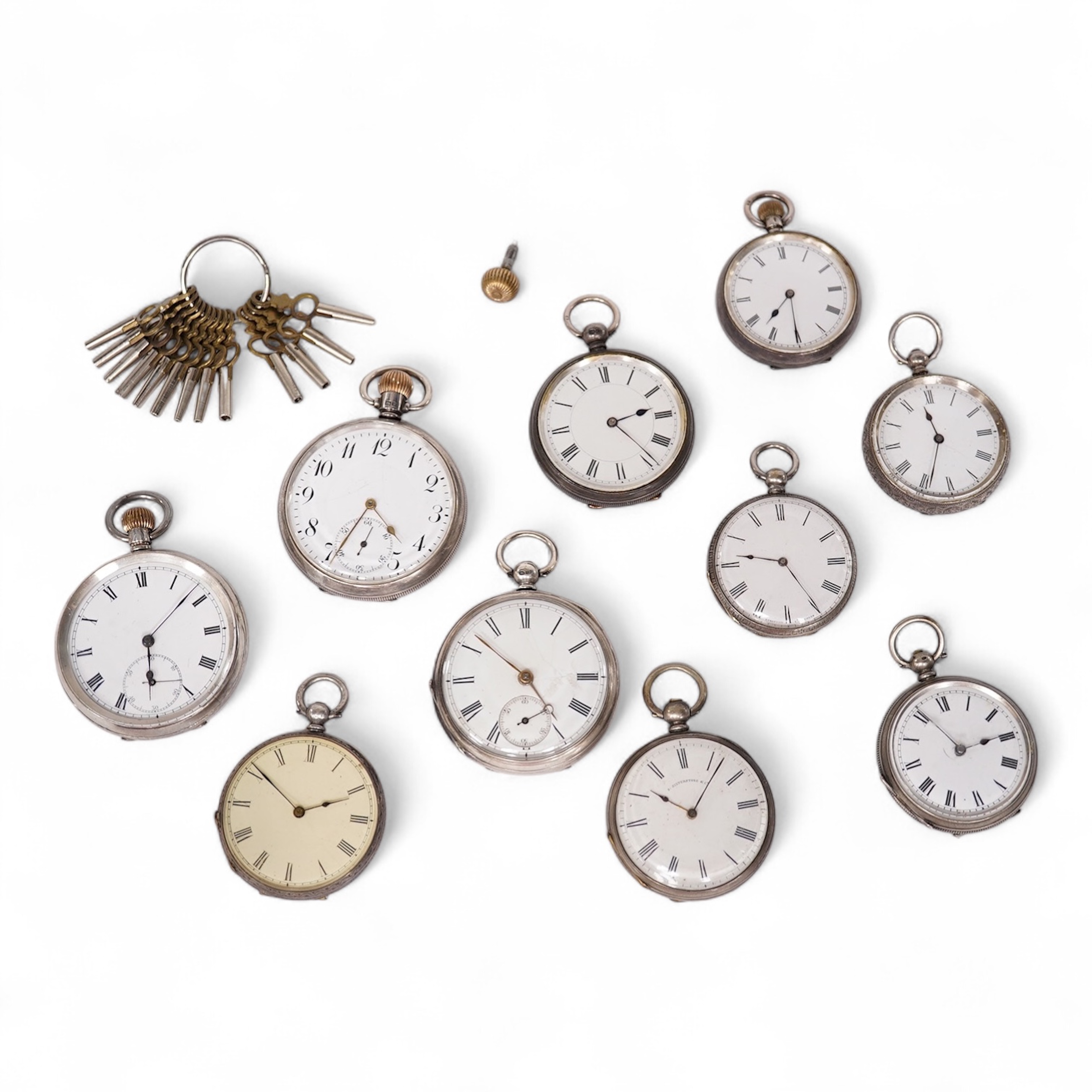Three early to mid 20th century silver open faced pocket watches, with Roman or Arabic dials and subsidiary seconds, including two keyless and one key wind (Admiral Tacy Watch Co), together with one smaller silver open f
